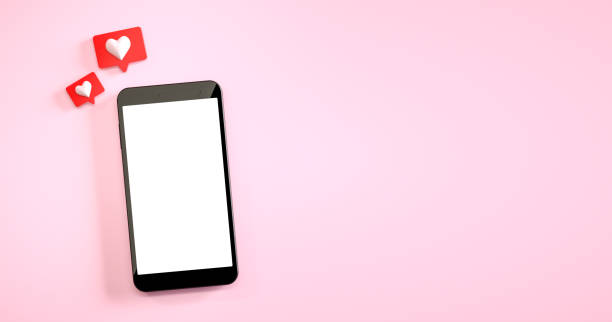 istock Mobile phone mockup with a like notification at pink background. 3d rendering 1308853495