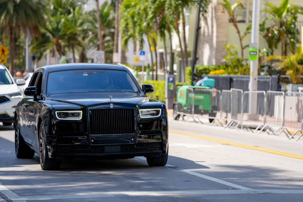 Rolls Royce in Miami Beach fromt view approaching Miami Beach, FL, USA - March 20, 2021: Rolls Royce in Miami Beach fromt view approaching rolls royce stock pictures, royalty-free photos & images