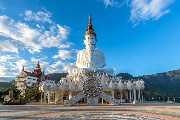 istock Five sitting white big Buddha statue at Wat Pha Sorn Kaew Temple at Khao Kho District (Phetchabun province, Thailand) 1308856117
