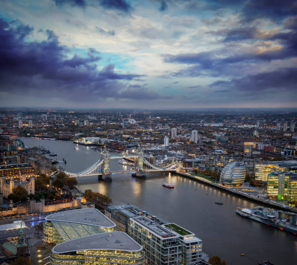 istock Elevated view to the illuminated Tower Bridge in London 1308857876