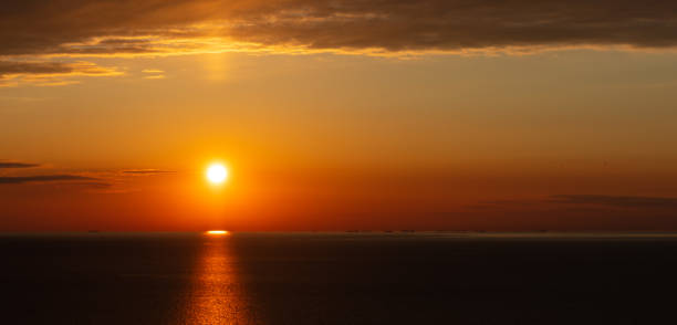istock beautiful sunset in the sea 1308858176