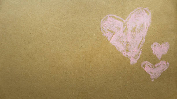 istock Heart symbol on a brown cardboard with a copy space. Valentine's Day concept. 1308866251