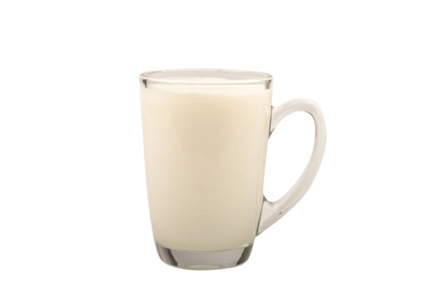 istock Milk in the cup isolated on white background. 1308867776