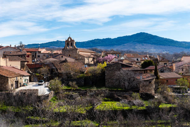 Scenic panoramic view of the the village of Horcajuelo de la Sierra during springtime Scenic panoramic view of the village of Horcajuelo de la Sierra in Madrid during springtime cherry blosson tree stock pictures, royalty-free photos & images