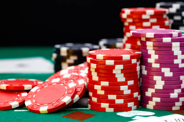 istock Stacks of playing chips on casino table 1308869697