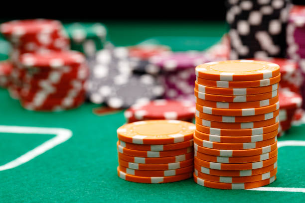 istock Stacks of playing chips on casino table 1308870629