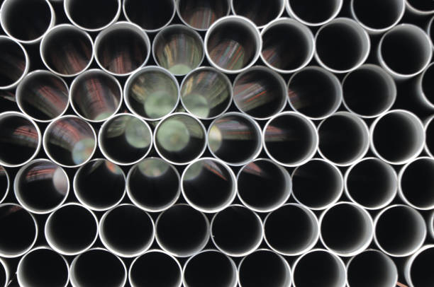 Stack of PVC water pipes on the side-street in In Jakarta, Indonesia.