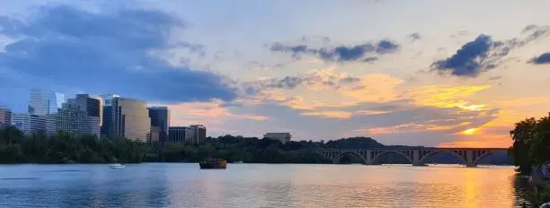 Georgetown Waterfront Park at sunset overlooking the Potomac River with boats, Washington DC