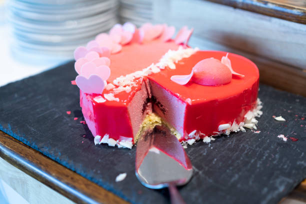 istock Cute cake on the shelf in a bakery 1308878749