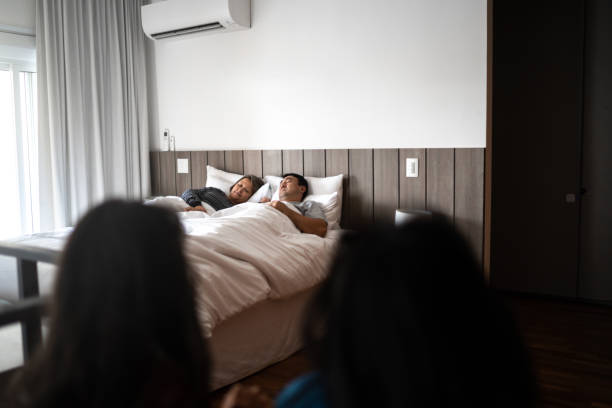 istock Sisters entering parent's bedroom while they are sleeping 1308879041