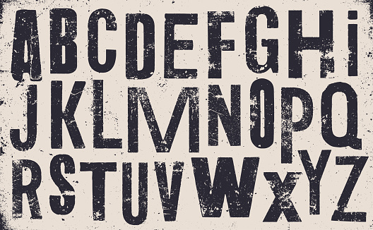 Vector distressed old uppercase alphabet. Black letters on white weathered texture background. Grunge and weathered capital letters.