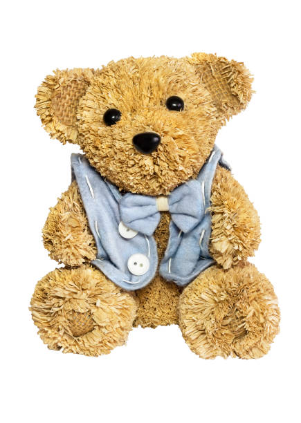 istock Traditional straw Teddy bear toy isolated on white background. 1308883088