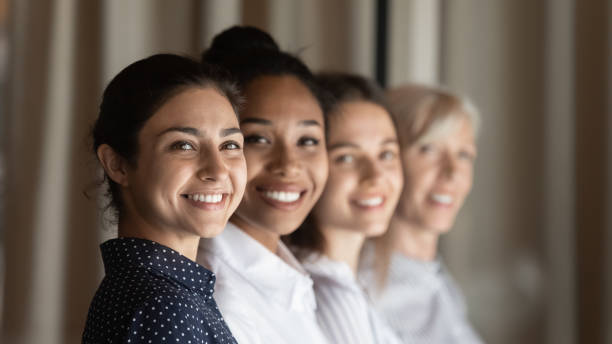 istock Smiling diverse multiethnic female colleagues show unity 1308883986