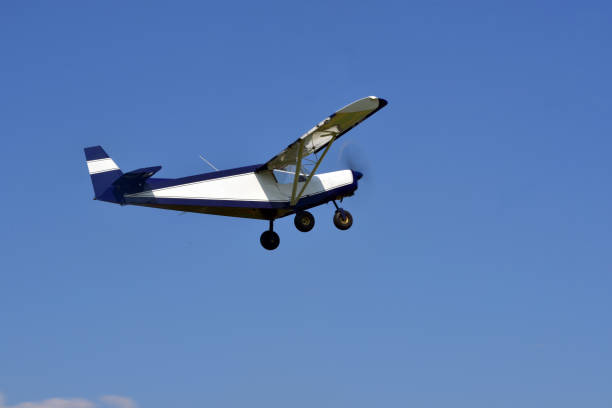 istock A small sports single-engine plane is flying 1308884839