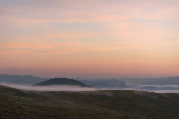 istock mountains sunrise fog clouds sky summer 1308886727
