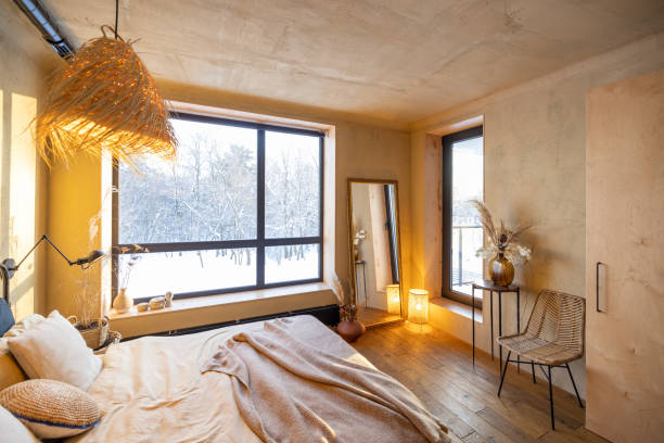 istock Stylish bedroom interior in natural boho style 1308888219