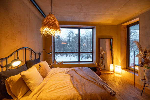 istock Stylish bedroom interior in natural boho style 1308888311