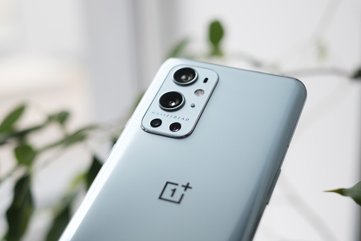 RIGA, MARCH 2021 - Newly launched OnePlus 9 Pro smartphone with Hasselblad camera system is displayed for editorial purposes