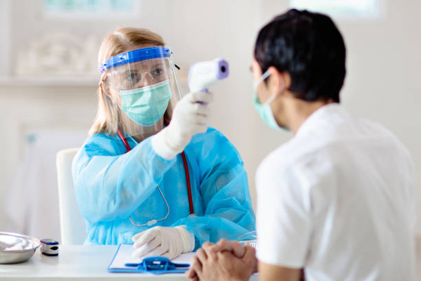 istock Coronavirus outbreak. Doctor and covid-19 patient. 1308893300
