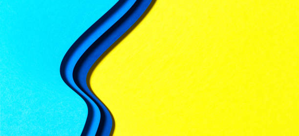 istock Abstract color papers geometry flat lay composition background with blue and yellow tones 1308895577