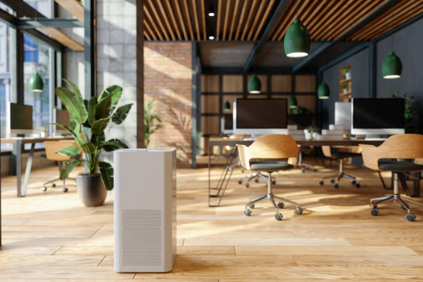 Air Purifier In Modern Open Plan Office For Fresh Air, Healthy Life, Cleaning And Removing Dust. Air Purifier In Modern Open Plan Office For Fresh Air, Healthy Life, Cleaning And Removing Dust. grooming product stock pictures, royalty-free photos & images