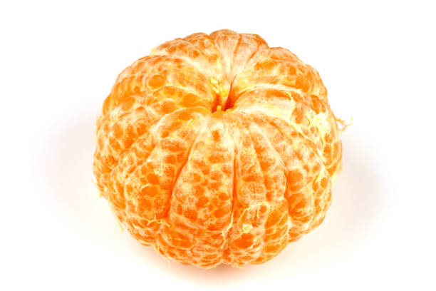 istock Peeled healthy tangerine fruit close-up on a white background 1308898697