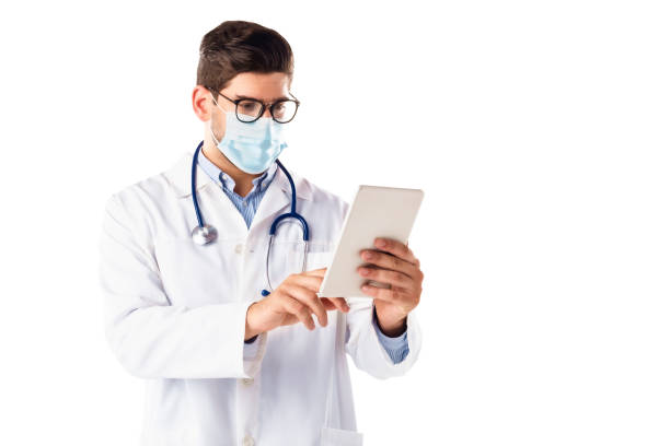 istock Male doctor studio portrait at isolated white background 1308898836