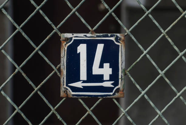 istock Weathered enamelled plate number 14 1308901579