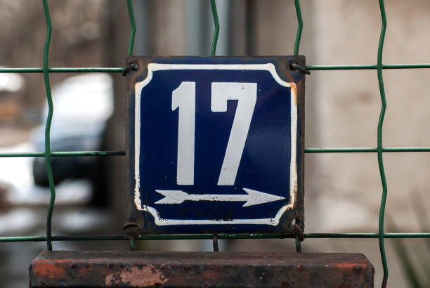 istock Weathered enamelled plate number 17 1308901606