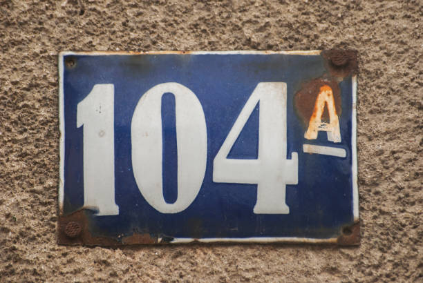 istock Weathered enamelled plate number 104 A 1308901609