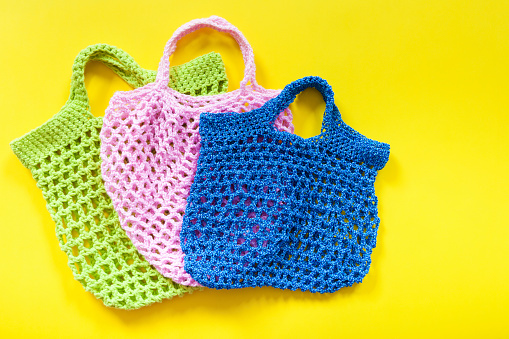 Handmade crocheted reusable shopping bags.