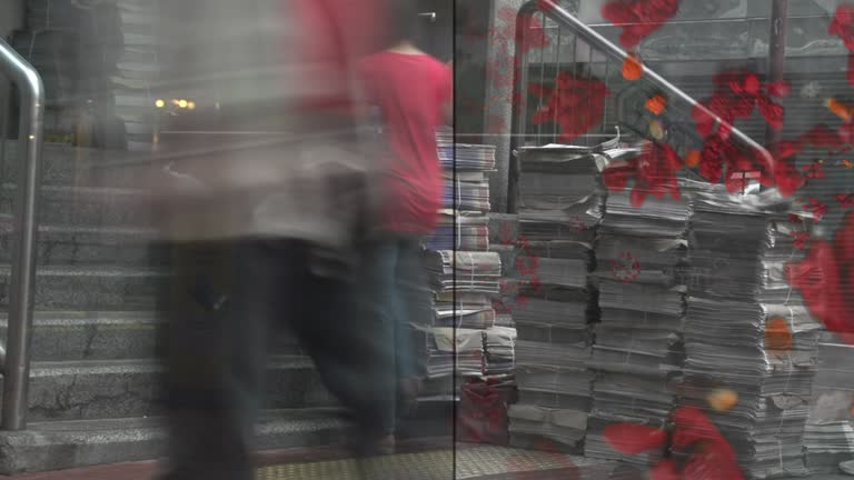 Hong Kong China Station Stairs Newspaper Seller from nobody to crowded cityscape