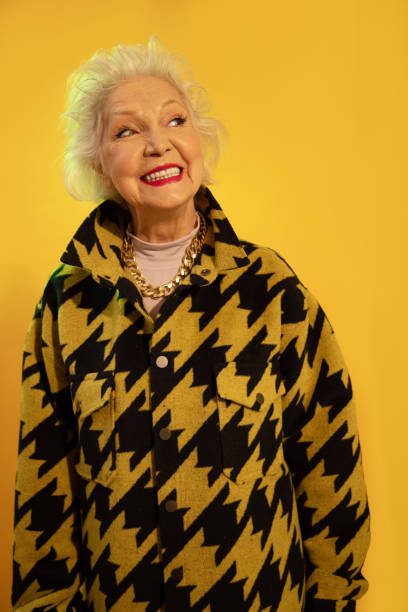istock Woman smiling widely while enjoying life in old age 1308910196