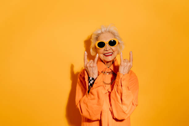 istock Woman doing rock symbol with hands up at the studio 1308910214