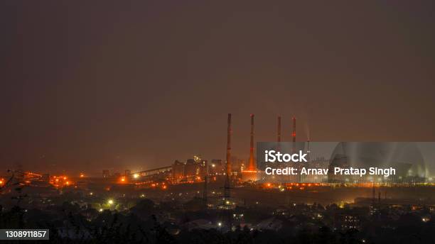 Night Urban Landscape With An Industrial Complex Stock Photo - Download Image Now - India, Steel, Kanpur