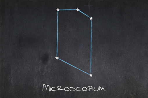 Blackboard with the Microscopium constellation drawn in the middle.