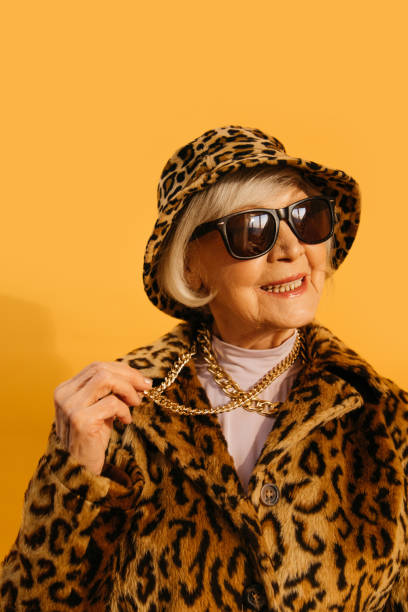 istock Woman showing her neck chain and looking away while spending time at the studio 1308915003