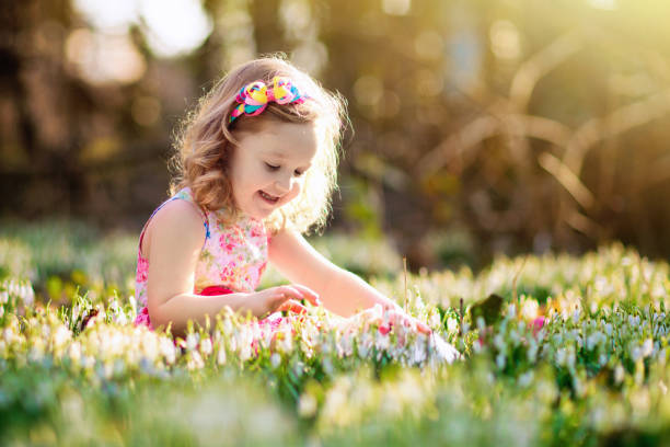 istock Child with rabbit. Easter bunny. Kids and pets. 1308917918