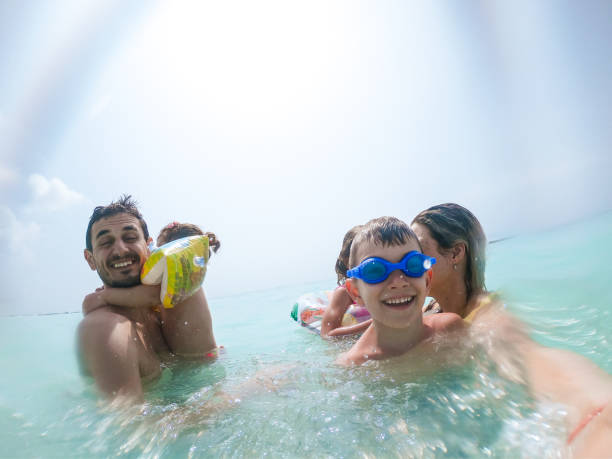 istock Young family enjoying vacation 1308918491