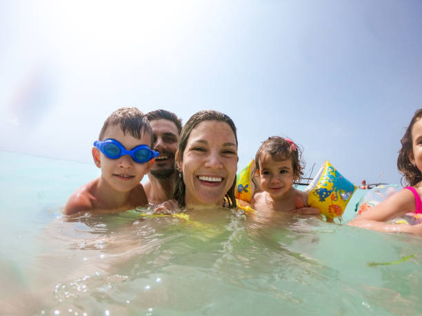 istock Young family enjoying vacation 1308919049