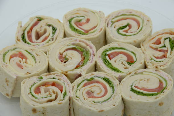istock Delicious Chicken And Swiss Pinwheels On Platter 1308919103