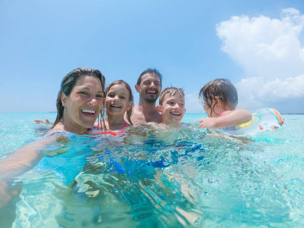 istock Young family enjoying vacation 1308919117