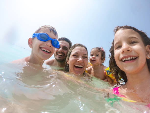 istock Young family enjoying vacation 1308919174