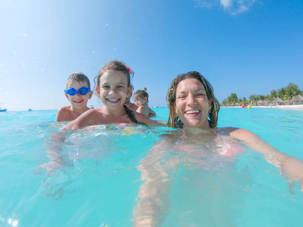 istock Young family enjoying vacation 1308919482
