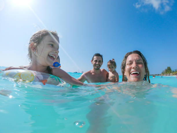 istock Young family enjoying vacation 1308919562