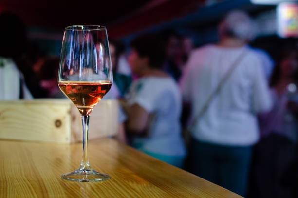 istock wine glass on a wood 1308919703