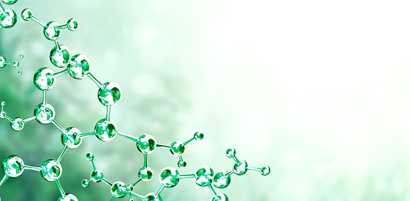 Models of abstract molecular structure on green background. Horizontal banner with glass model of molecule. Copy space for your text. Mock up template. 3d render