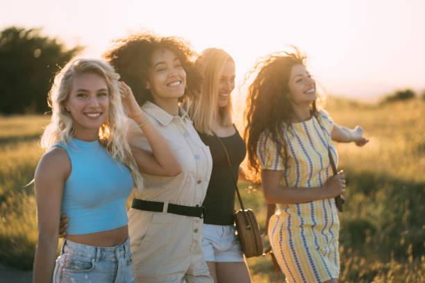 istock Girls having party on a sunset light 1308923596