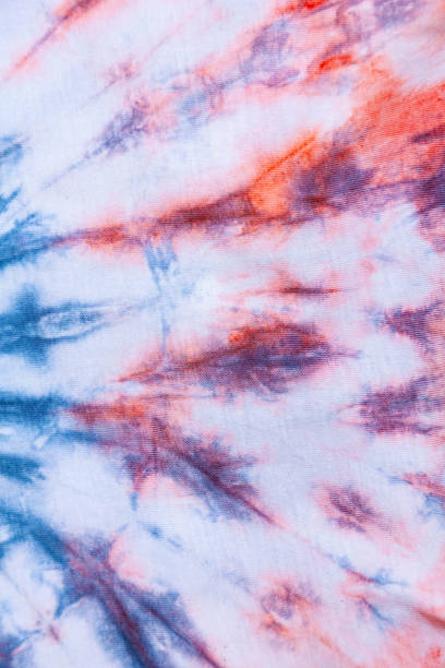 istock Tie Dye back ground . Red,blue and white,strips drawing with paints 1308928795