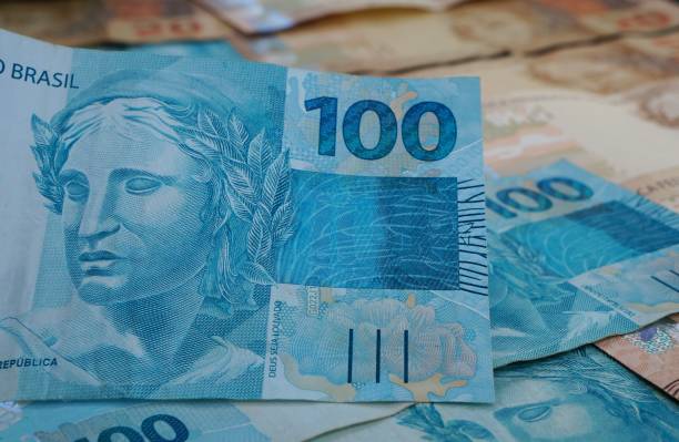istock Brazilian money. Brazilian 100 Real note. 1308929796